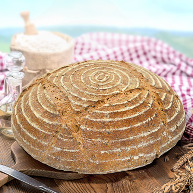 Aus unserer eigenen Bäckerei: Dinkel-Emmer-Brot. Urgetreidebrote wie das Dinkel-Emmer-Brot werden in unserer eigenen Bäckerei gebacken.